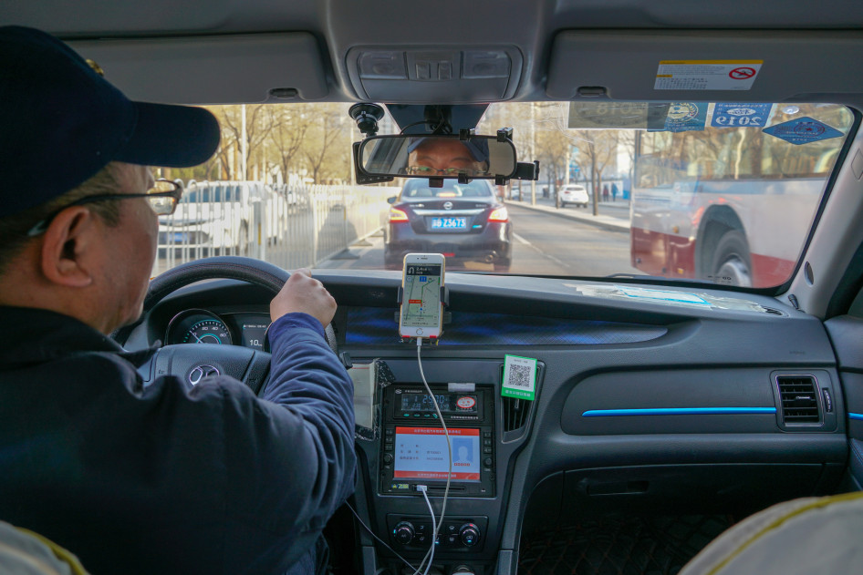 Kínai taxisofőr
